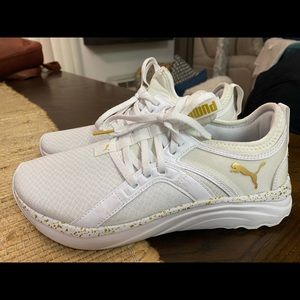 The Softride Sophia sneaker from Puma efficiently combines comfort with style.